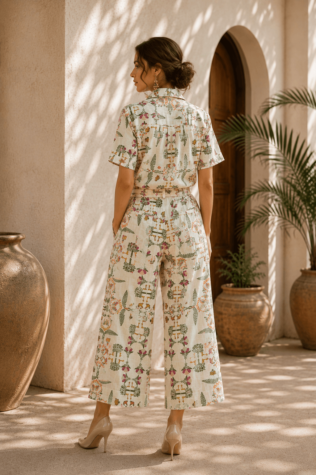 Back view of a short-sleeve Sundarban print shirt and wide-leg trousers.