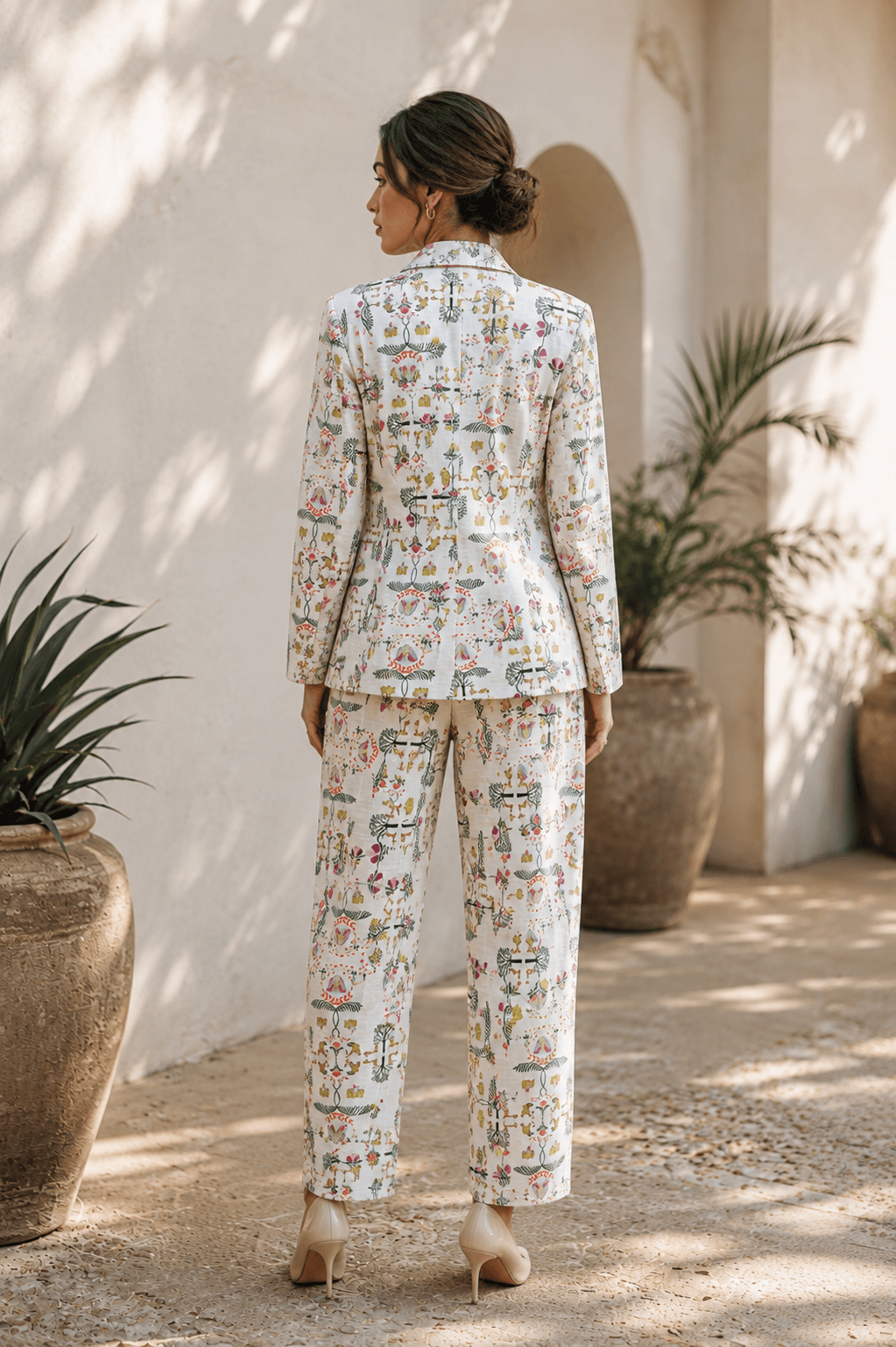 Back view of a Sundarban print blazer and trousers.